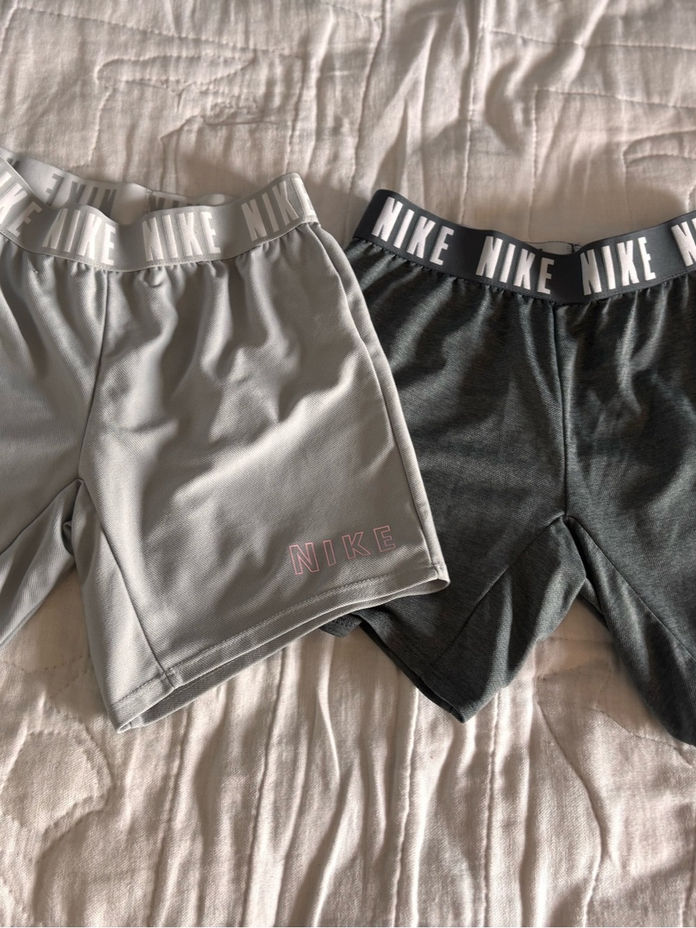 2 Pair Nike Dri-Fit Shorts. Girls Medium. One light gray one dark gray.